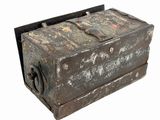 an old metal box with a lock on it