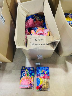 several boxes of toys are sitting on the floor next to each other