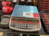 a picture of a scale with a lot of tools on it