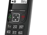 a close up of a phone on a stand on a white background