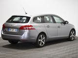 a picture of a silver car that is parked in a room