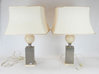 pair of mid - century modern table lamps with marble bases and shades