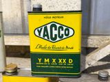 a yellow and green sign that says yacco on it