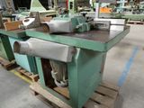 a machine that is sitting on a pallet in a factory