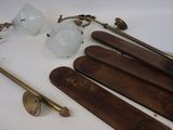 many different types of skis and ski poles on the table