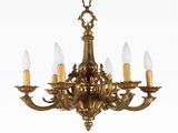 un lustre ancien en laiton à cinq lumières
