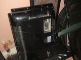 an image of a room with a fan and a television