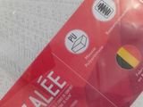 a plastic bag with a sticker on it sitting on a table