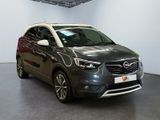 opelc car parked in a showroom with white walls
