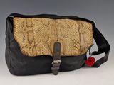 an image of a snake skin purse with a black strap