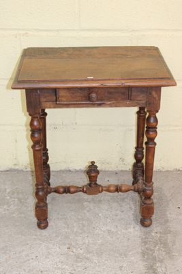 a small wooden table with a drawer on top of it