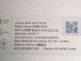 the back of a laptop with a qr code on it