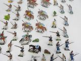 a lot of figurines that are on a table