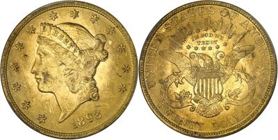 a gold coin with a woman ' s head on it