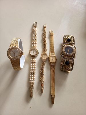 Lot de 5 montres non testées à revoir