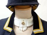 a mannequin wearing a hat with a collar around it