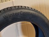a close up of a tire that is sitting on a cardboard box