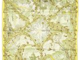 a yellow and white square scarf with a floral design