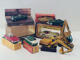 a lot of toy cars that are sitting on a table