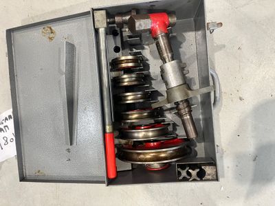 a metal box with some springs inside of it