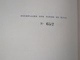 an open book with a black and white title on it