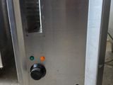 an image of a toaster oven with the door open