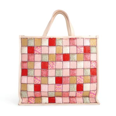 a close up of a pink and red bag on a white background