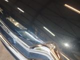a close up of a car ' s front bumper