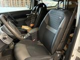 an image of a car with a black leather seat cover
