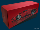a red box with a picture of a red sports car on it