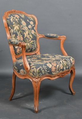 an image of a chair with a floral upholstered seat