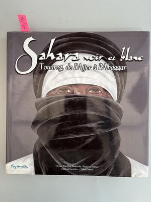 a book with a picture of a man wrapped in plastic
