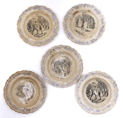 four plates with images of people on them on a white surface