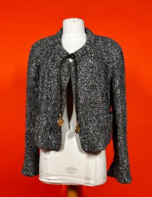 a black and white jacket on a mannequin mannequin mannequin mannequin mannequin mannequin mannequin mannequin mann
