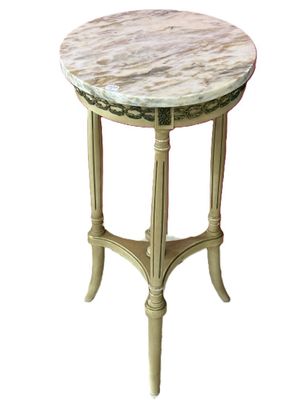 une image d'une table avec un plateau en marbre sur un fond blanc