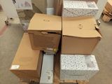many boxes stacked on top of each other on a pallet