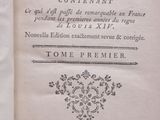 an old book with a black and white title on it