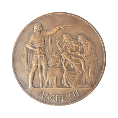 an image of a bronze medal with a picture of a man and a woman