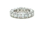 a close up of a diamond ring on a white background