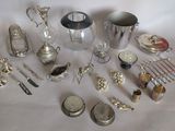 a lot of silver items that are on a table