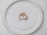 a close up of a plate with a flower on it