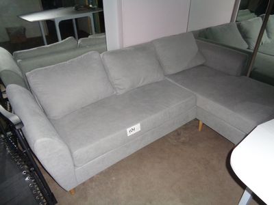 a couch that is sitting in the corner of a room