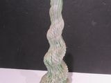 a glass vase that is sitting on a table