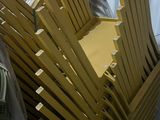 a lot of chairs that are sitting in a room