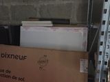 a box of electronic equipment sitting on a shelf in a room