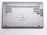 a laptop that is sitting on a white surface
