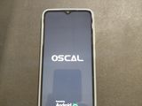 a cell phone that is plugged into a charger