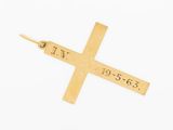 a close up of a cross on a white surface with a white background