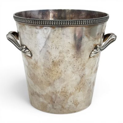 silver plated ice bucket with handles and handles on a white background