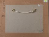 a picture of a box with a pair of scissors in it